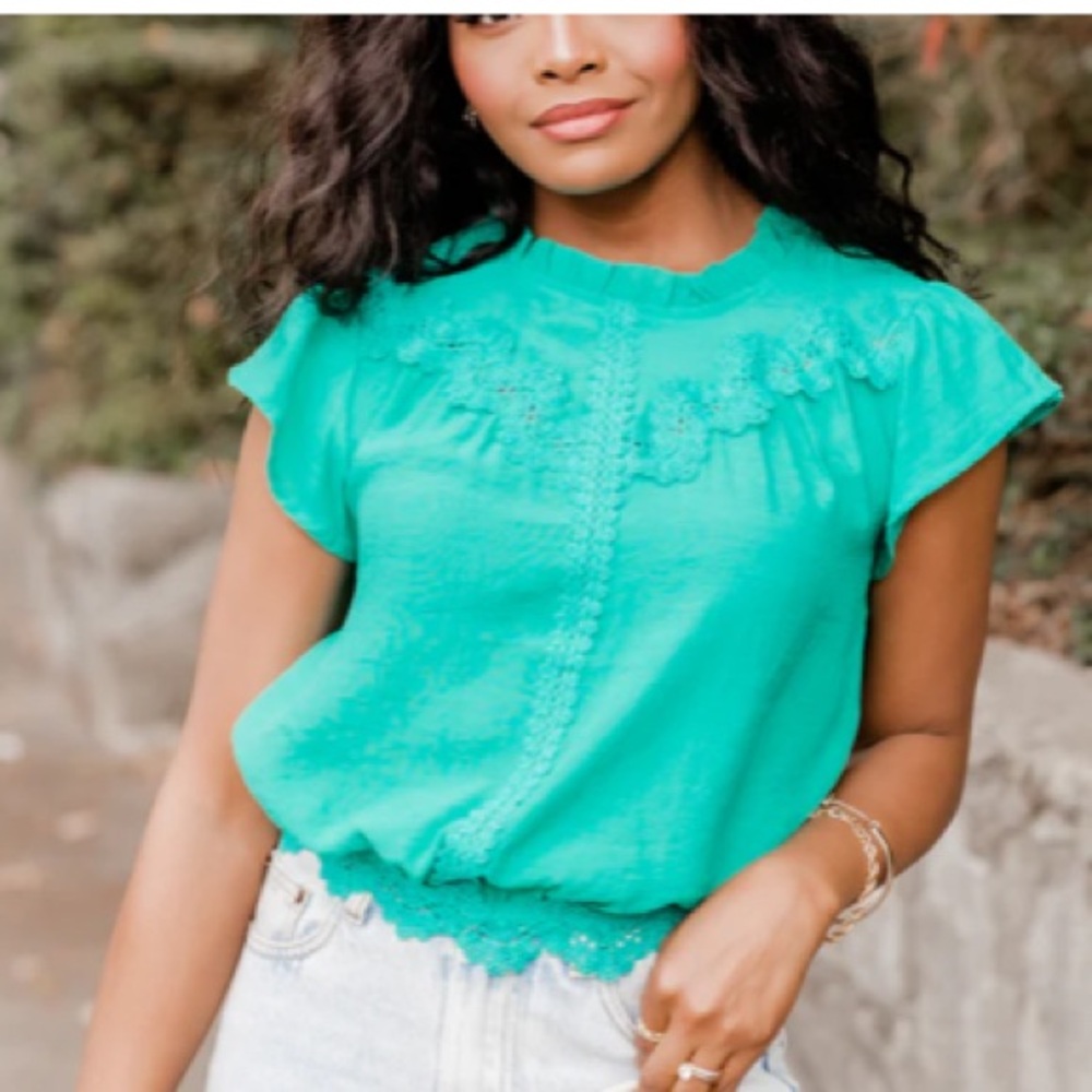 Stunning green top with crochet detailing